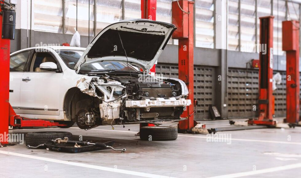 interior-of-a-car-repair-in-garage-service-station-with-soft-focus-and-over-light-in-the-background-2CFRJYH